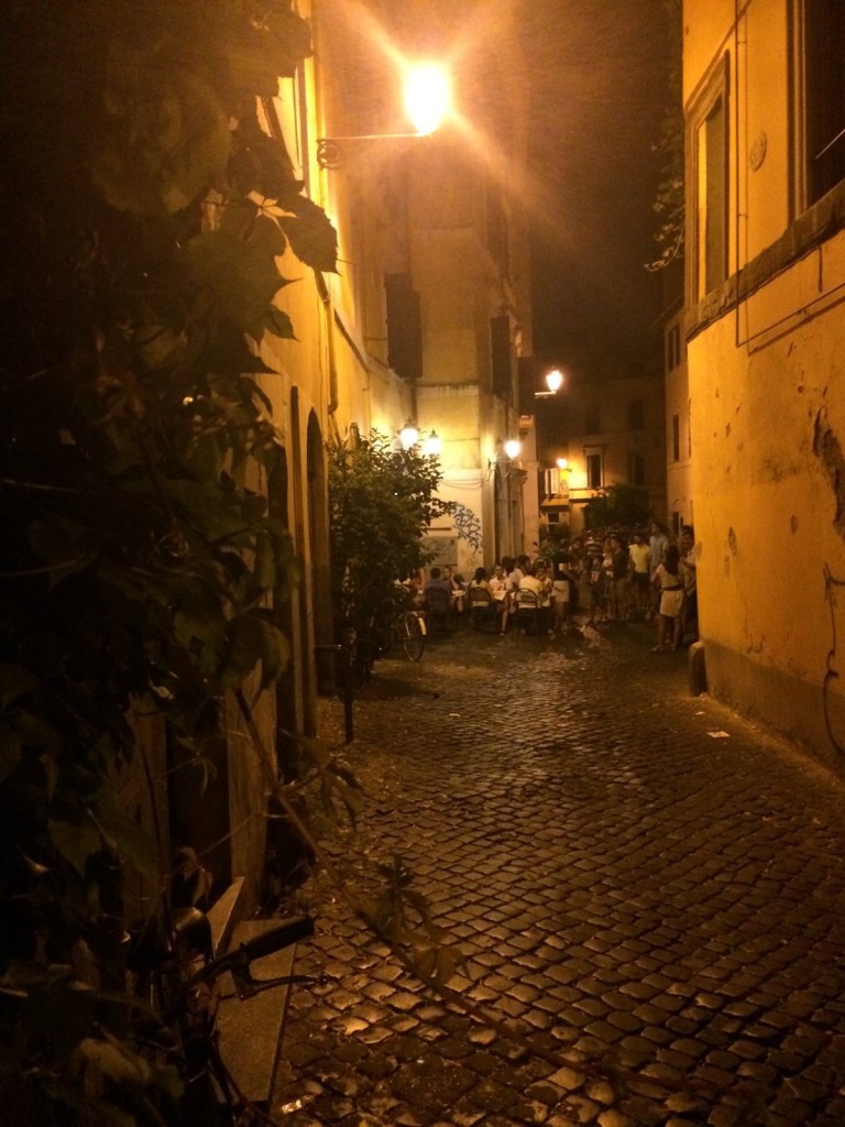 explore the nightlife in the streets of trastevere