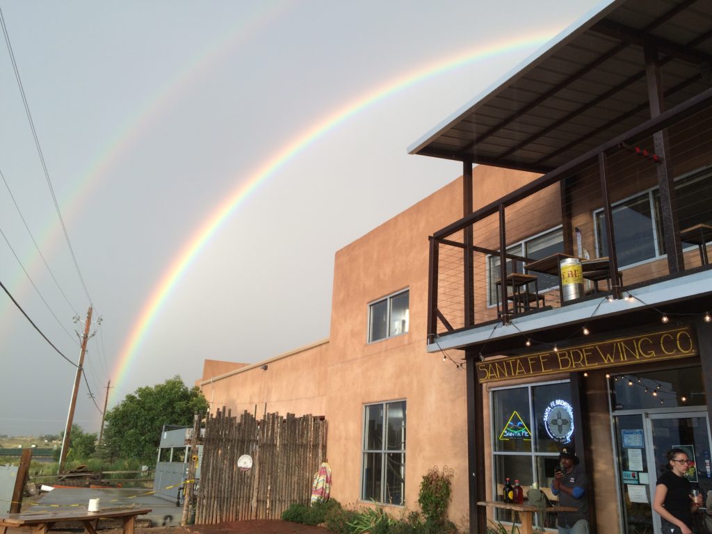 rainbow over a brewery in Santa Fe New Mexico