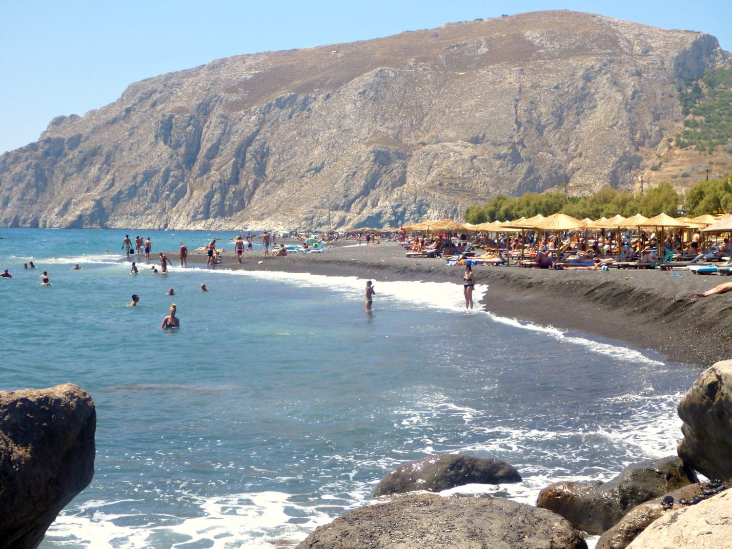 The black sand of Kamari Beach.