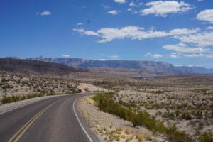 road in big bend national park with mountain and desert views
