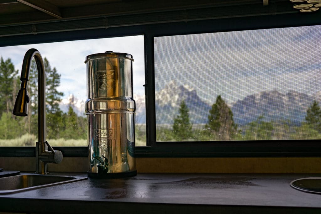 water filter system sitting on counter in rv camper kitchen