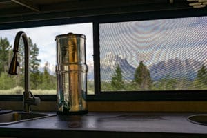 water filter system sitting on counter in rv camper kitchen