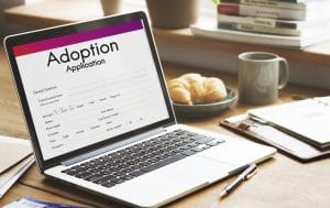 Computer with adoption application open