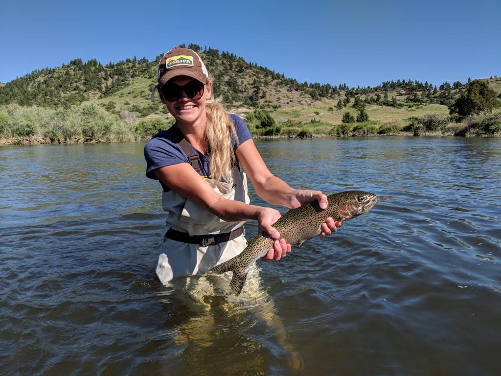 Woman fly fishing in montana