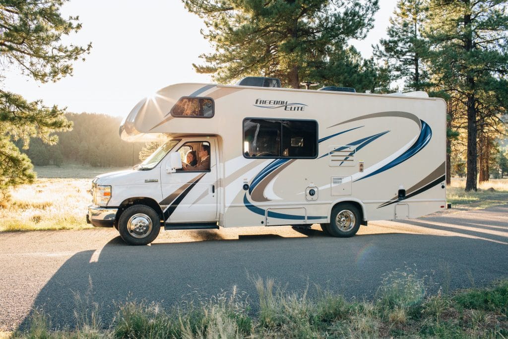 RV parked with sun shining on it