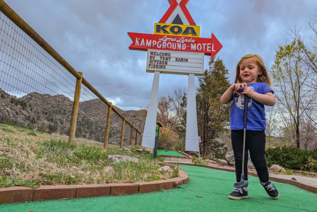 Our niecce's first time golfing! toddler miniature golfing at KOA campground